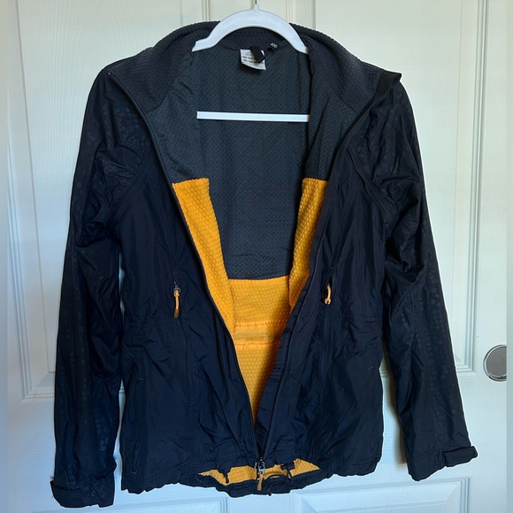 Adidas small grey patterned rain jacket with orange accents - Picture 3 of 4